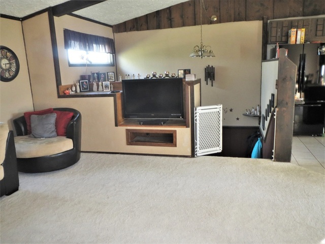 9536 West Woosung Road Dixon, IL 61021 - Photo 4 of 24 a living room with furniture and a flat screen tv