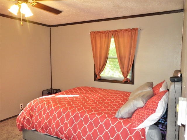 9536 West Woosung Road Dixon, IL 61021 - Photo 8 of 24 a bedroom with a bed and a window