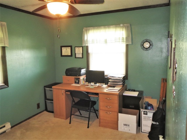 9536 West Woosung Road Dixon, IL 61021 - Photo 9 of 24 a view of a workspace with furniture and a window