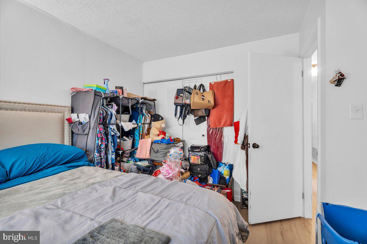 18 Chiswick Drive Lindenwold, NJ 08021 - Photo 20 of 23 a bed room with a bed and a closet