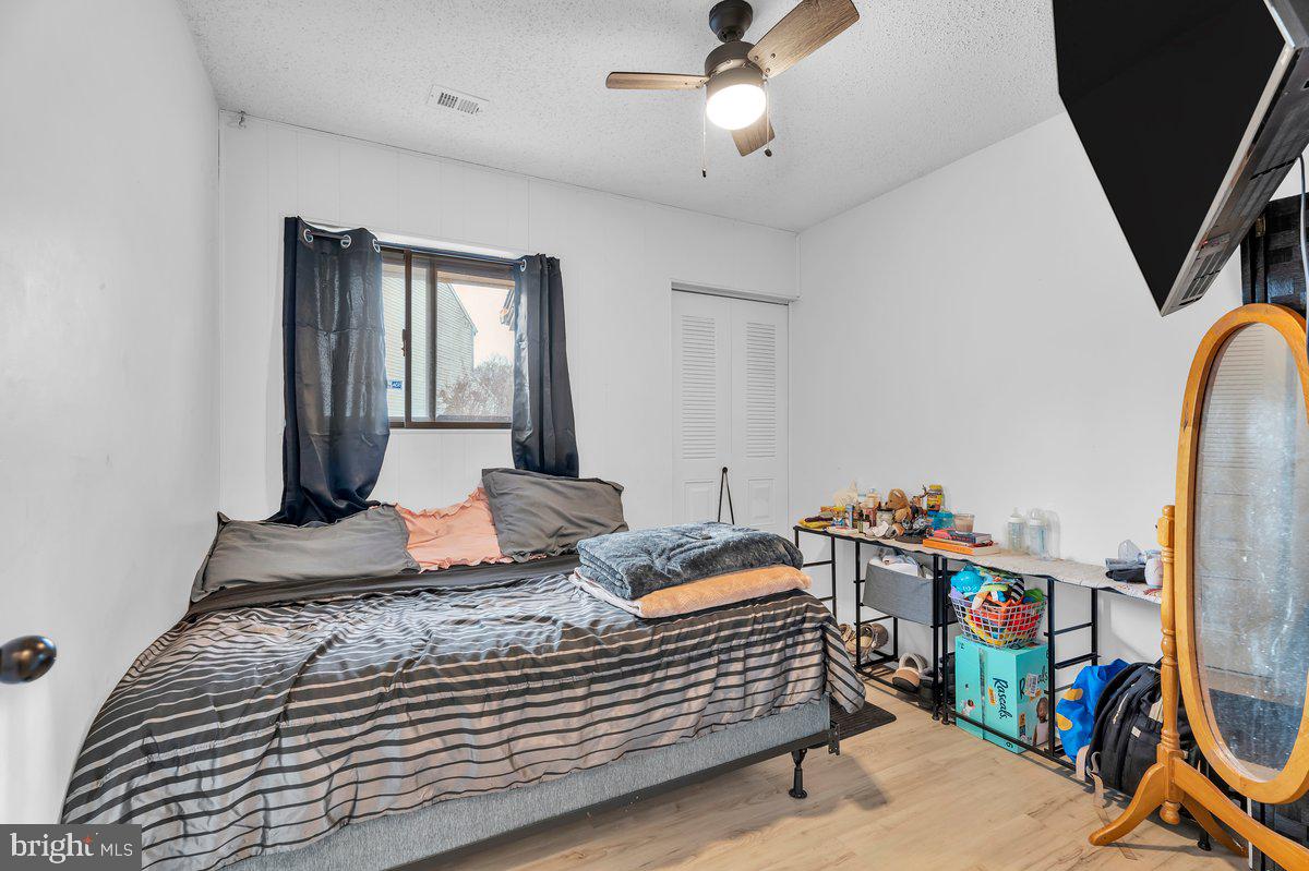 18 Chiswick Drive Lindenwold, NJ 08021 - Photo 21 of 23 a bedroom with bed and wooden floor