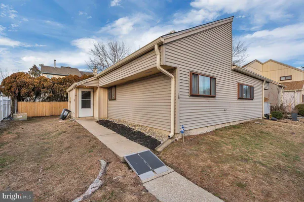 a view of backyard of house