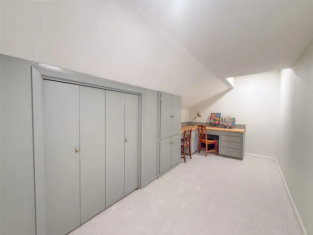 a view of a room with furniture