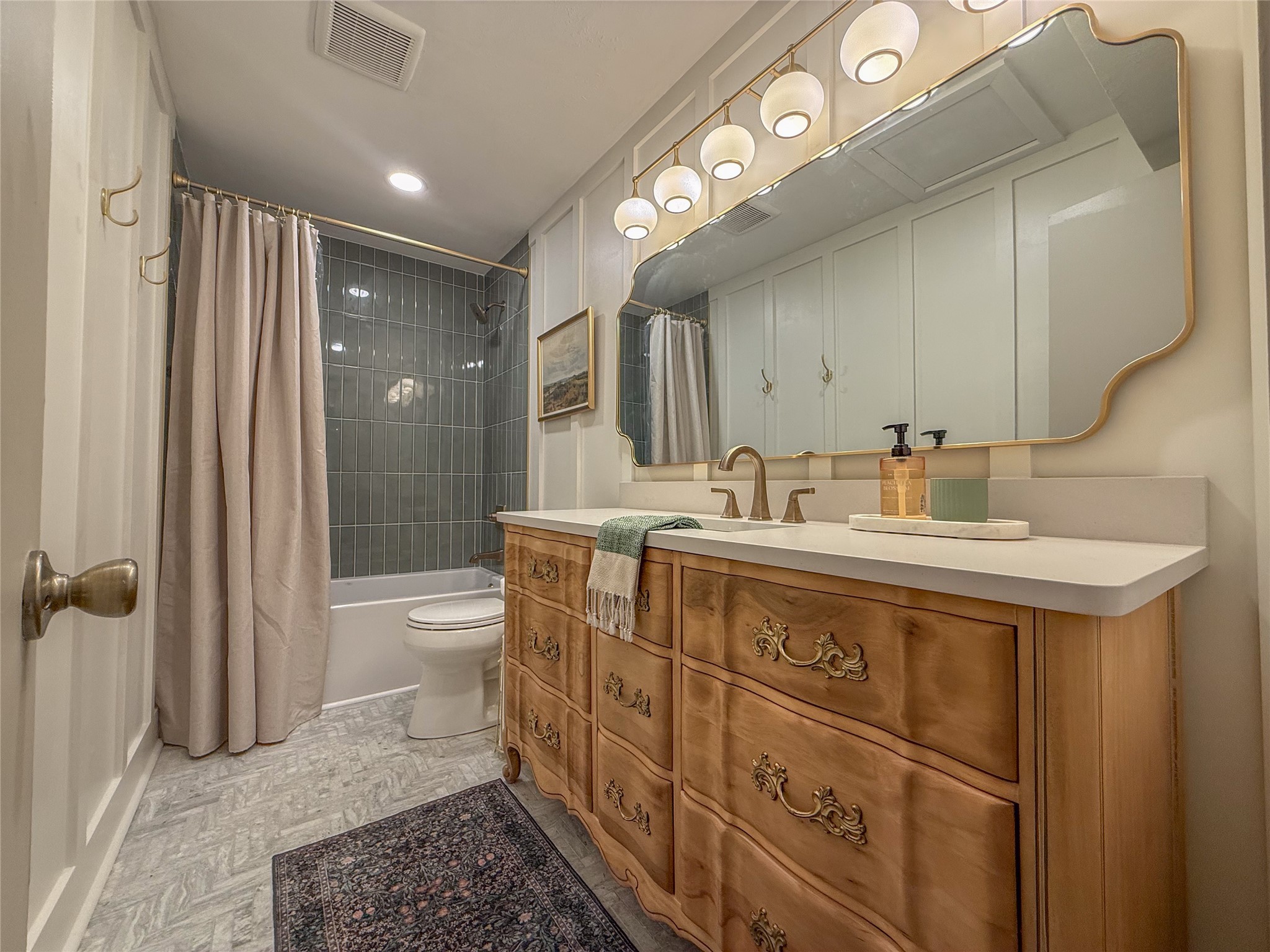 1704 Harrison Road Brenham, TX 77833 - Photo 20 of 34 a bathroom with a sink a toilet a mirror and shower