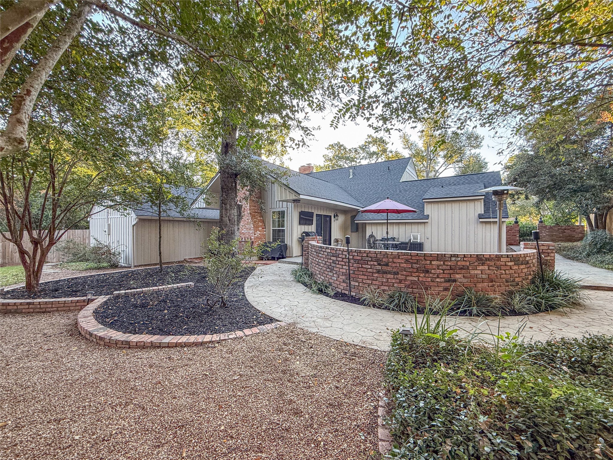 1704 Harrison Road Brenham, TX 77833 - Photo 23 of 34 a front view of house with yard and trees