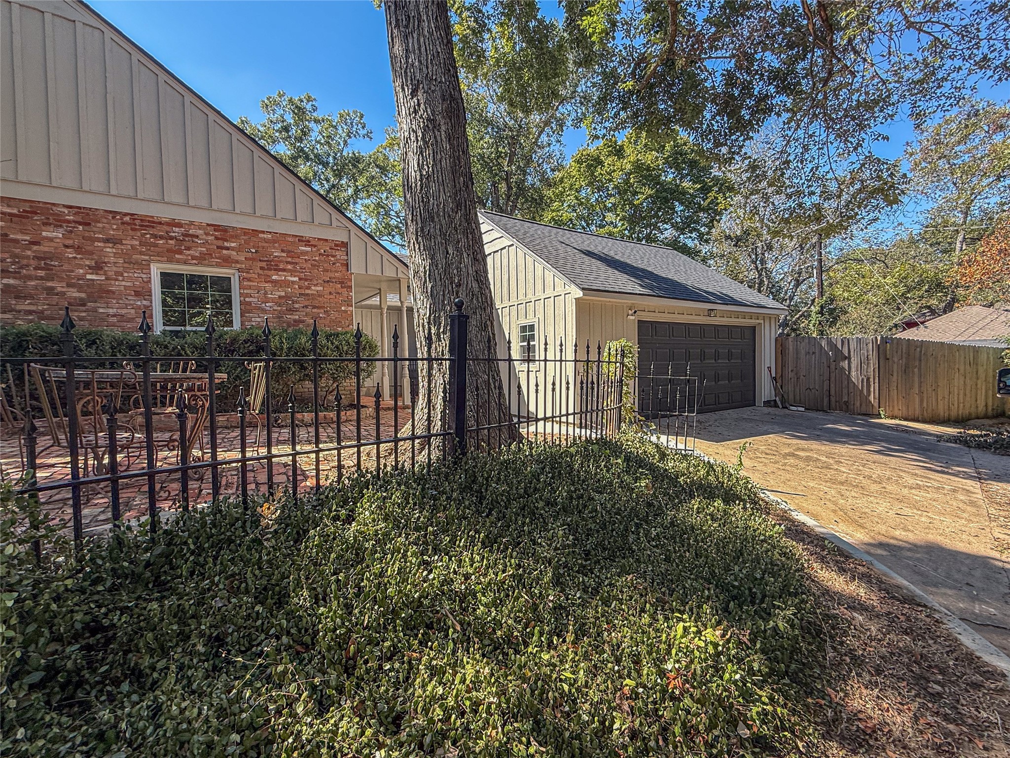 1704 Harrison Road Brenham, TX 77833 - Photo 31 of 34 a view of a house with a backyard
