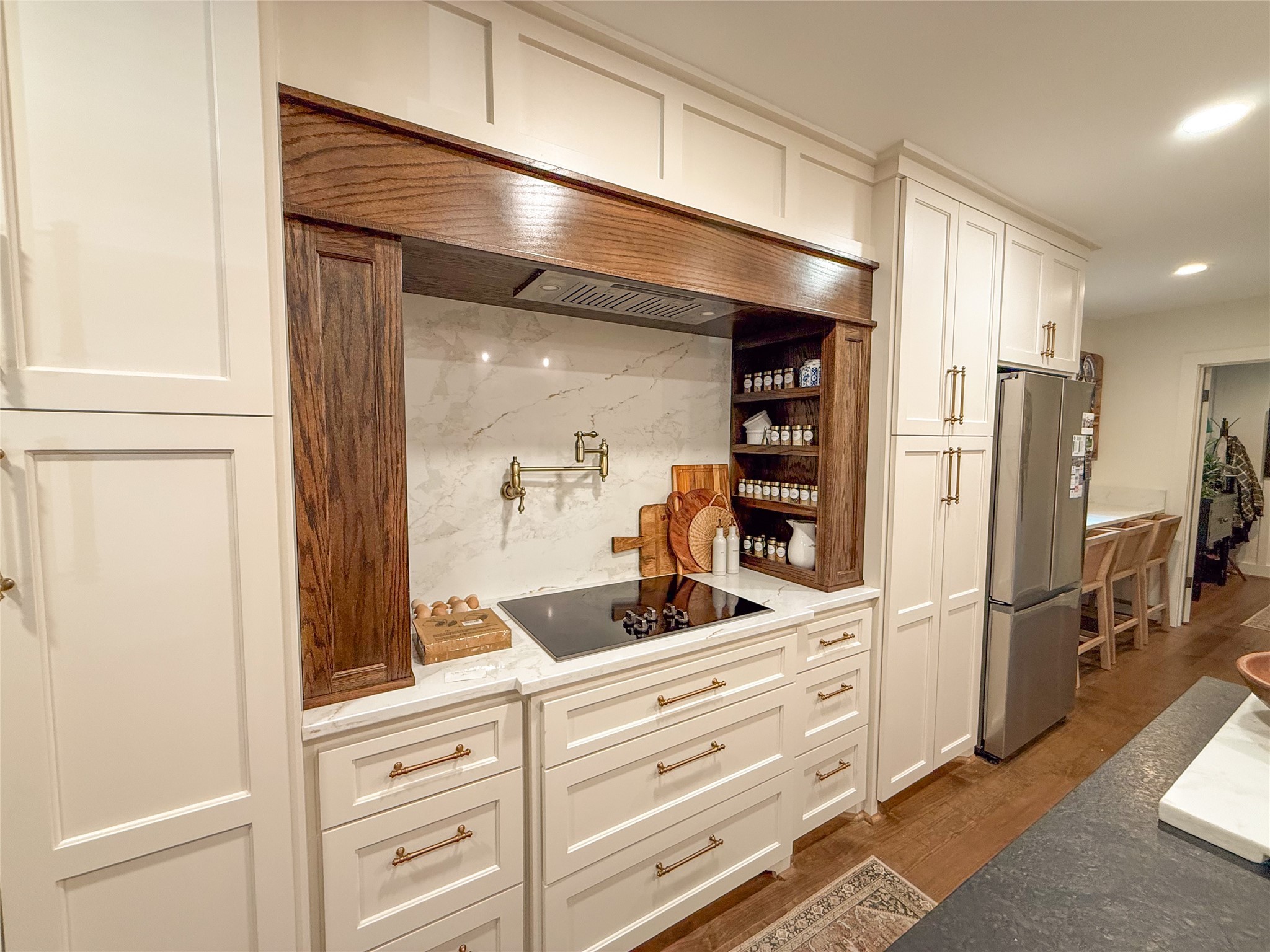 1704 Harrison Road Brenham, TX 77833 - Photo 8 of 34 a kitchen with stainless steel appliances a refrigerator and cabinets