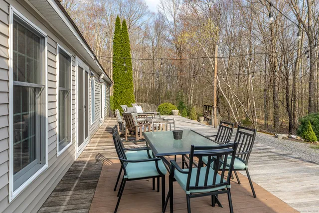 a view of an outdoor space with furniture