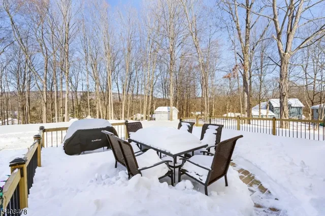 a view of street with a snow on the road