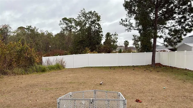 a view of parking space with trees