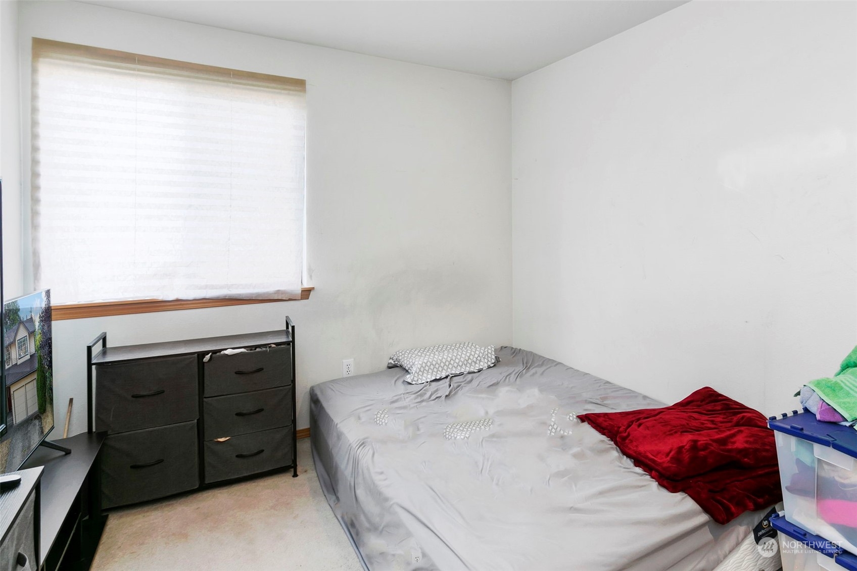 32335 7th Avenue Southwest Federal Way, WA 98023 - Photo 22 of 27 a bedroom with a bed and a dresser