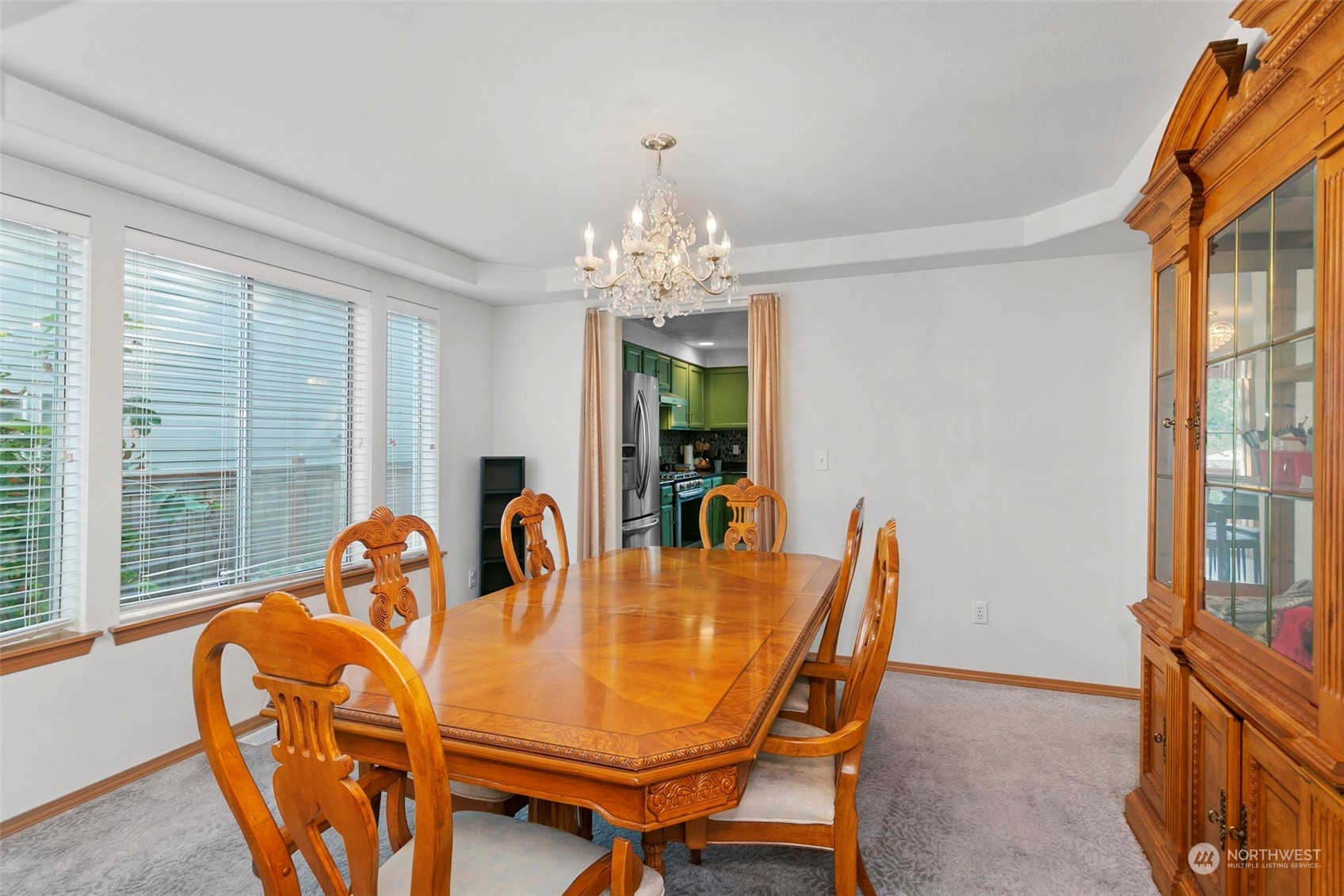 32335 7th Avenue Southwest Federal Way, WA 98023 - Photo 7 of 27 a dining room with furniture a livingroom view and a chandelier