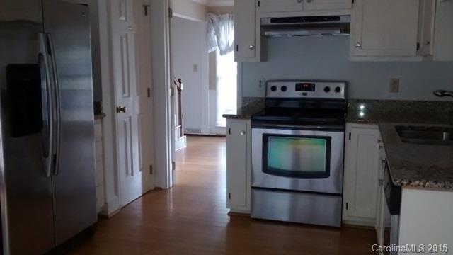2464 Winding Trail Lane Fort Mill, SC 29708 - Photo 2 of 22 a kitchen with stainless steel appliances granite countertop a stove and a refrigerator