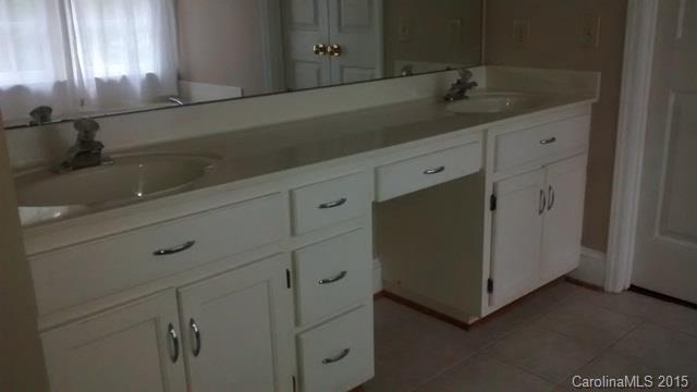 2464 Winding Trail Lane Fort Mill, SC 29708 - Photo 12 of 22 a kitchen with cabinets and window