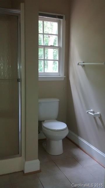 2464 Winding Trail Lane Fort Mill, SC 29708 - Photo 14 of 22 a white toilet sitting next to a window