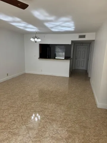 a view of kitchen and utility room