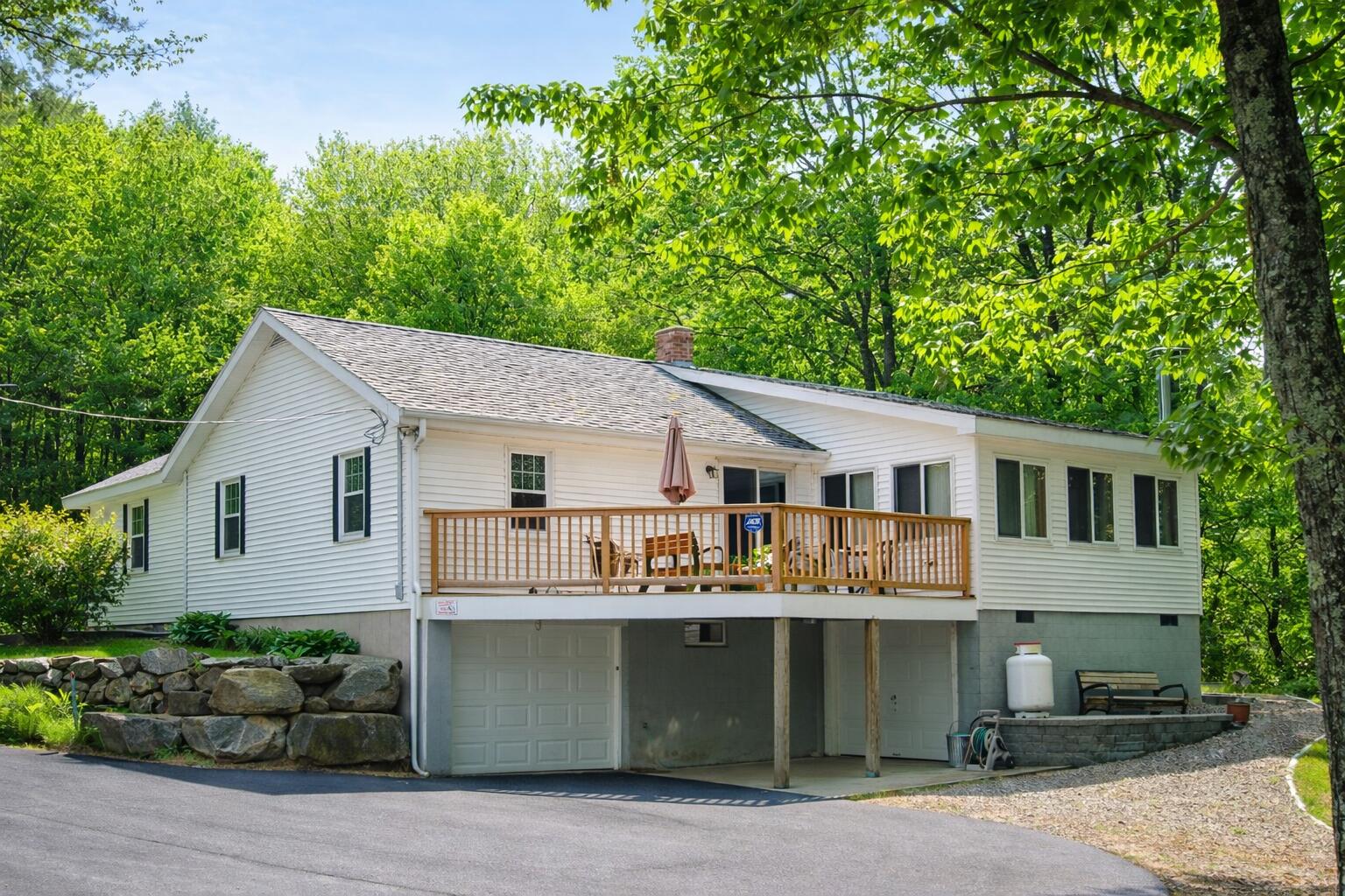 89 Boyds Corner Road South Berwick, ME 03908 - Photo 6 of 58 Back View of Deck and 2 Bay Garage
