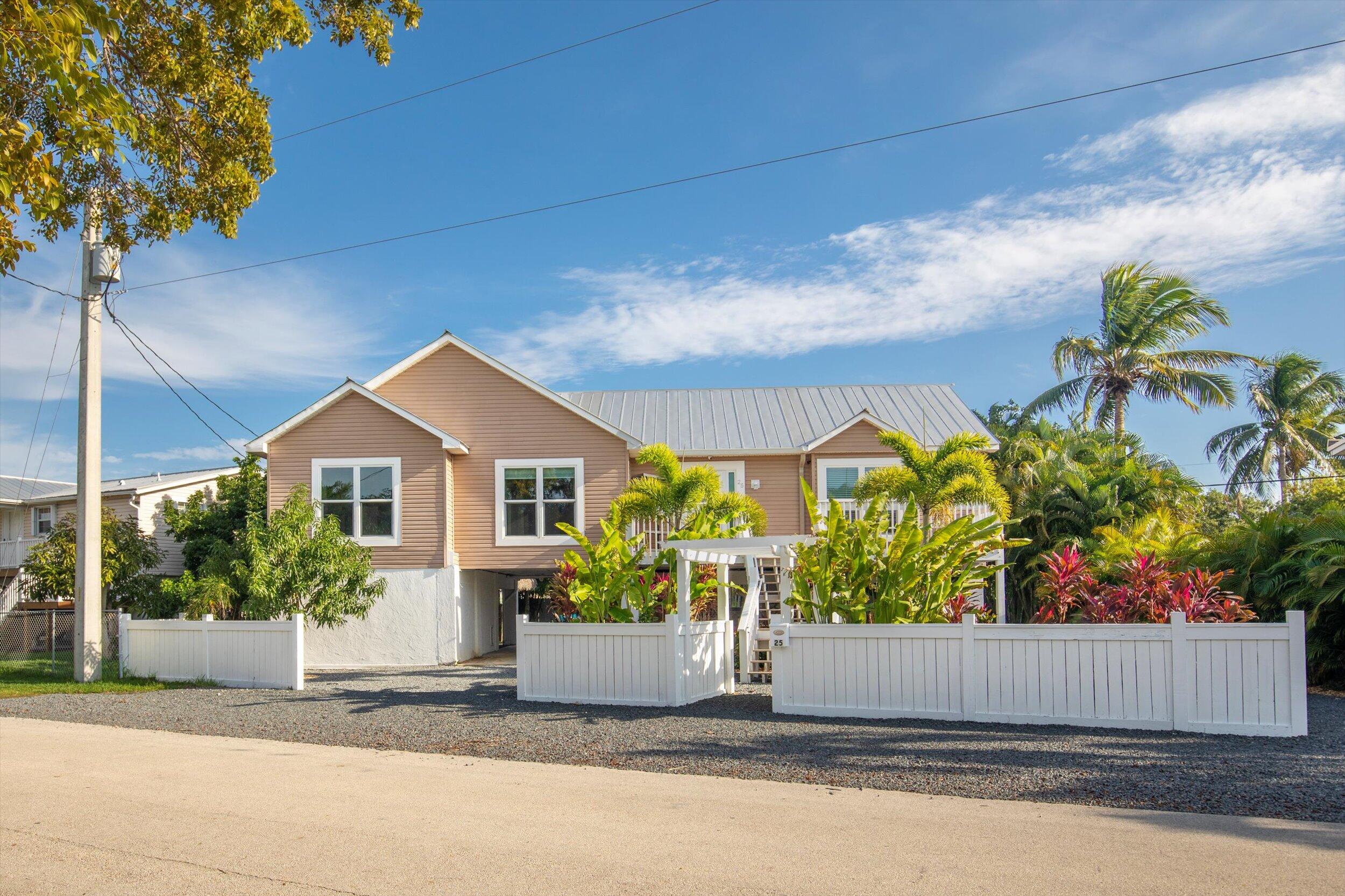 a house view with a garden space