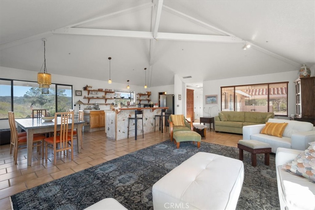 9750 Random Canyon Way Creston, CA 93432 - Photo 14 of 73 a living room with lots of furniture and a large window