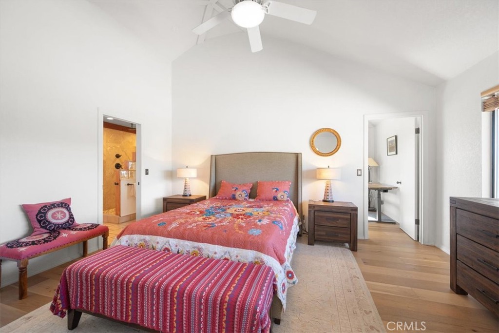 9750 Random Canyon Way Creston, CA 93432 - Photo 25 of 73 a bedroom with a bed and a chandelier