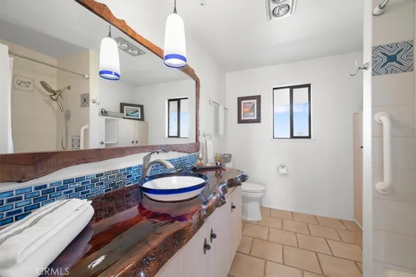 a front view of a house with a patio