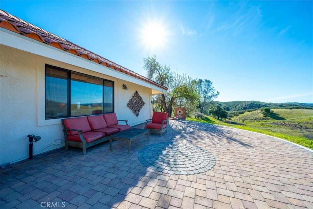 9750 Random Canyon Way Creston, CA 93432 - Photo 56 of 73 a backyard of a house with yard and outdoor seating