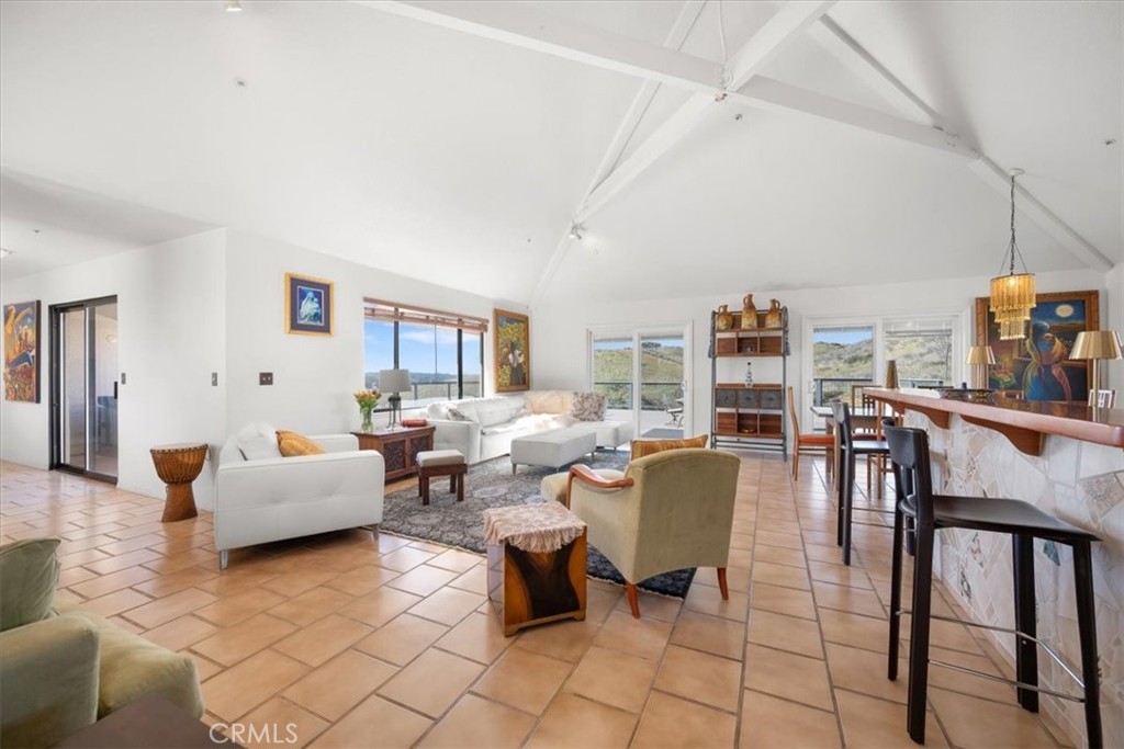 9750 Random Canyon Way Creston, CA 93432 - Photo 9 of 73 a living room with furniture and a large window