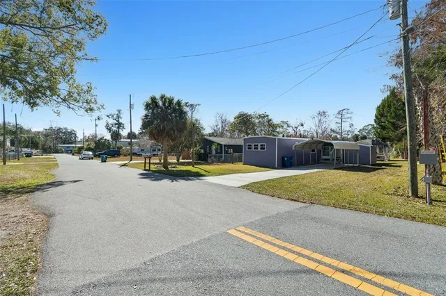 an aerial view of a house with a garden
