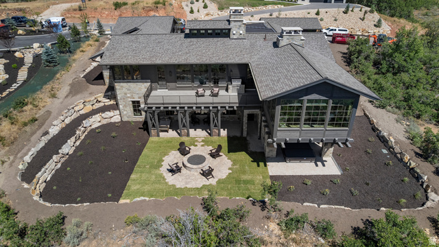 2192 East Outlaw Road Kamas, UT 84036 - Photo 2 of 80 Multi-level exterior featuring a stone and wood-clad facade