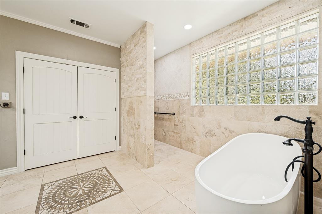 9 Country Ridge Road Melissa, TX 75454 - Photo 19 of 37 The shower and floor are one level for ease of entering the shower. Doors are to 1 of 3 closets.