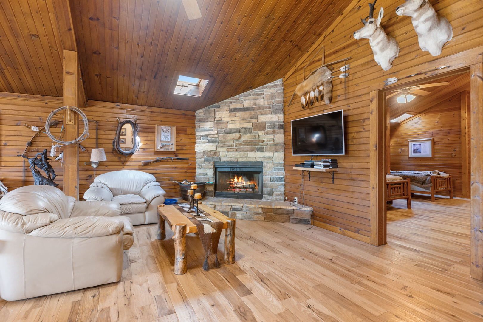8970 Millbrook Road Millbrook, IL 60541 - Photo 5 of 30 a living room with furniture wooden floor and a fireplace