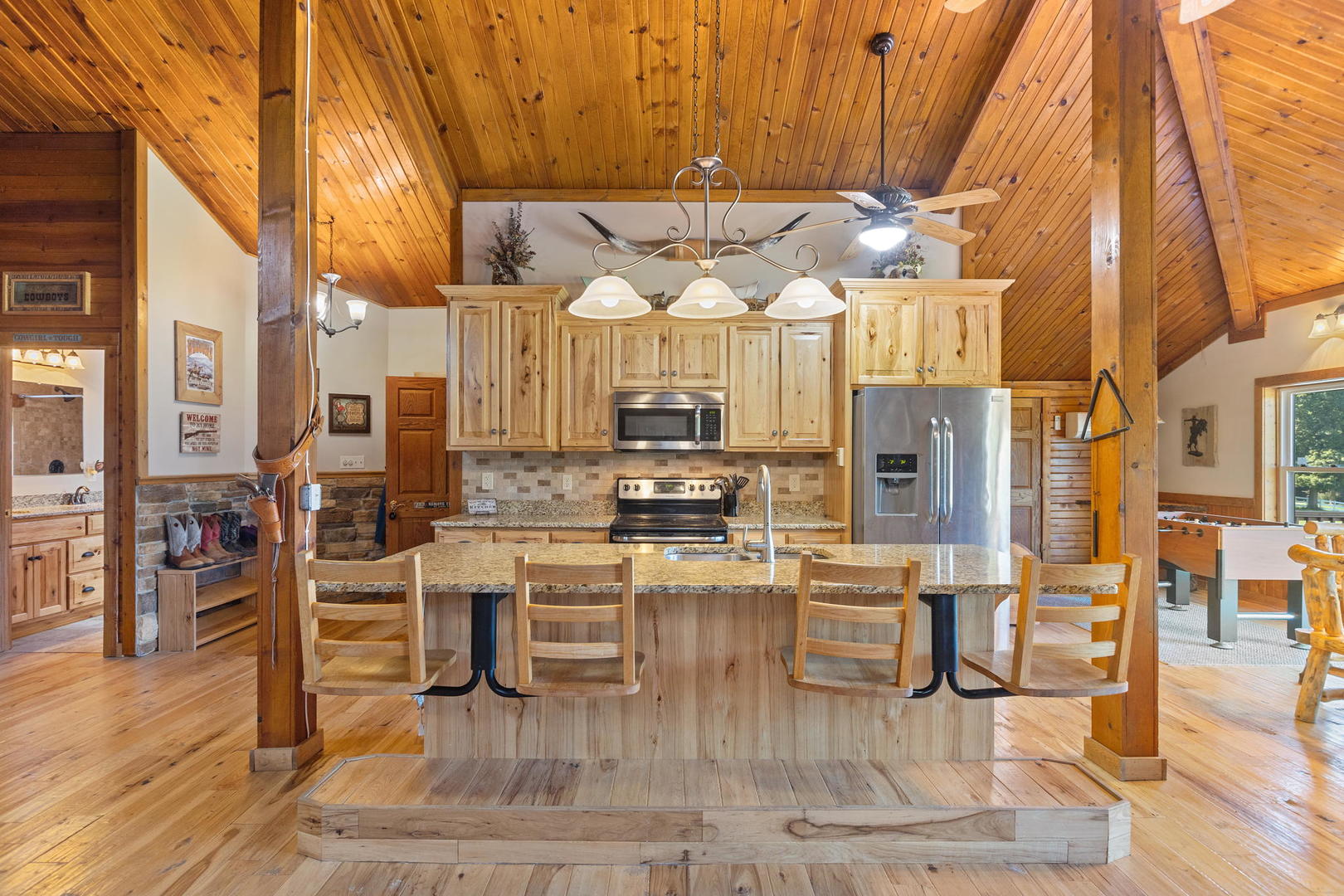 8970 Millbrook Road Millbrook, IL 60541 - Photo 7 of 30 a kitchen with stainless steel appliances granite countertop a stove top oven a sink and cabinets