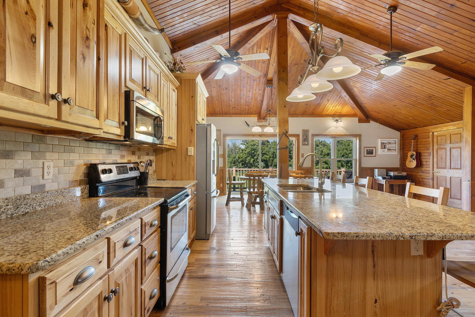 8970 Millbrook Road Millbrook, IL 60541 - Photo 8 of 30 a kitchen with stainless steel appliances granite countertop a lot of counter space