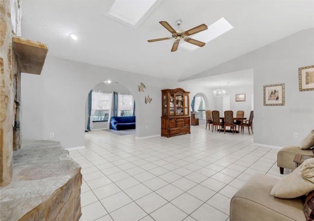 4308 Allen Road Fruitland Park, FL 34731 - Photo 5 of 33 a living room with furniture and kitchen view