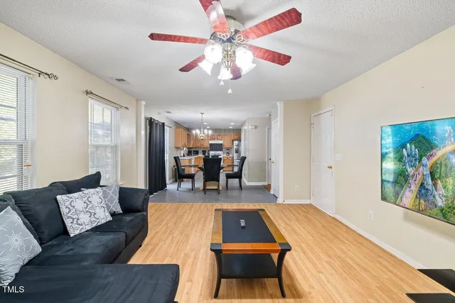 a room with furniture and a flat screen tv