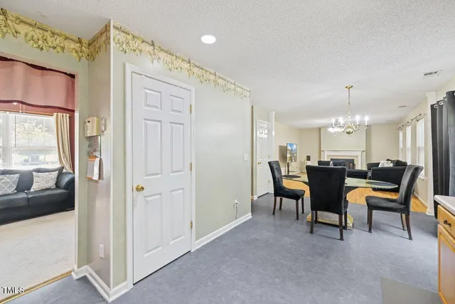 a view of a livingroom with furniture and window