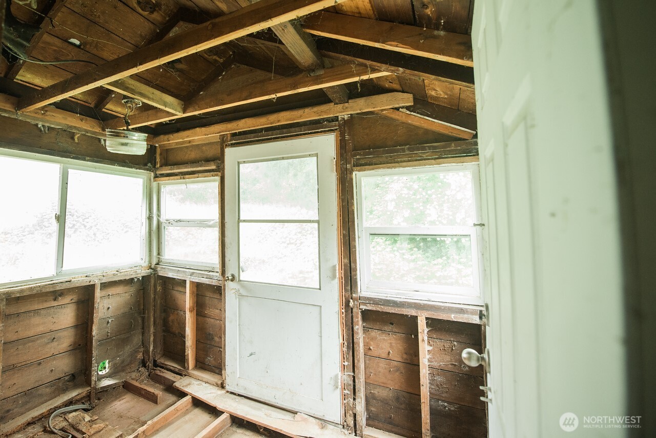 10379 Bethel Burley Road Southeast Port Orchard, WA 98367 - Photo 16 of 40 a view of an empty room with a window