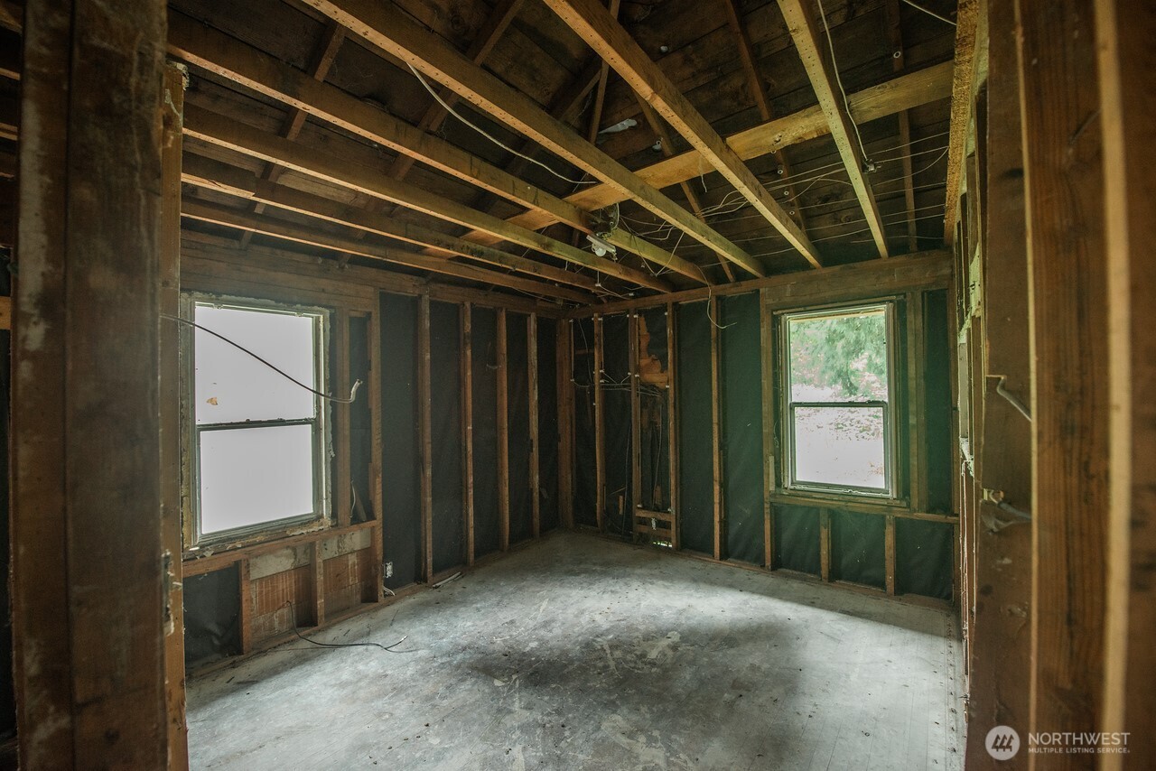 10379 Bethel Burley Road Southeast Port Orchard, WA 98367 - Photo 19 of 40 a view of an empty room with a window