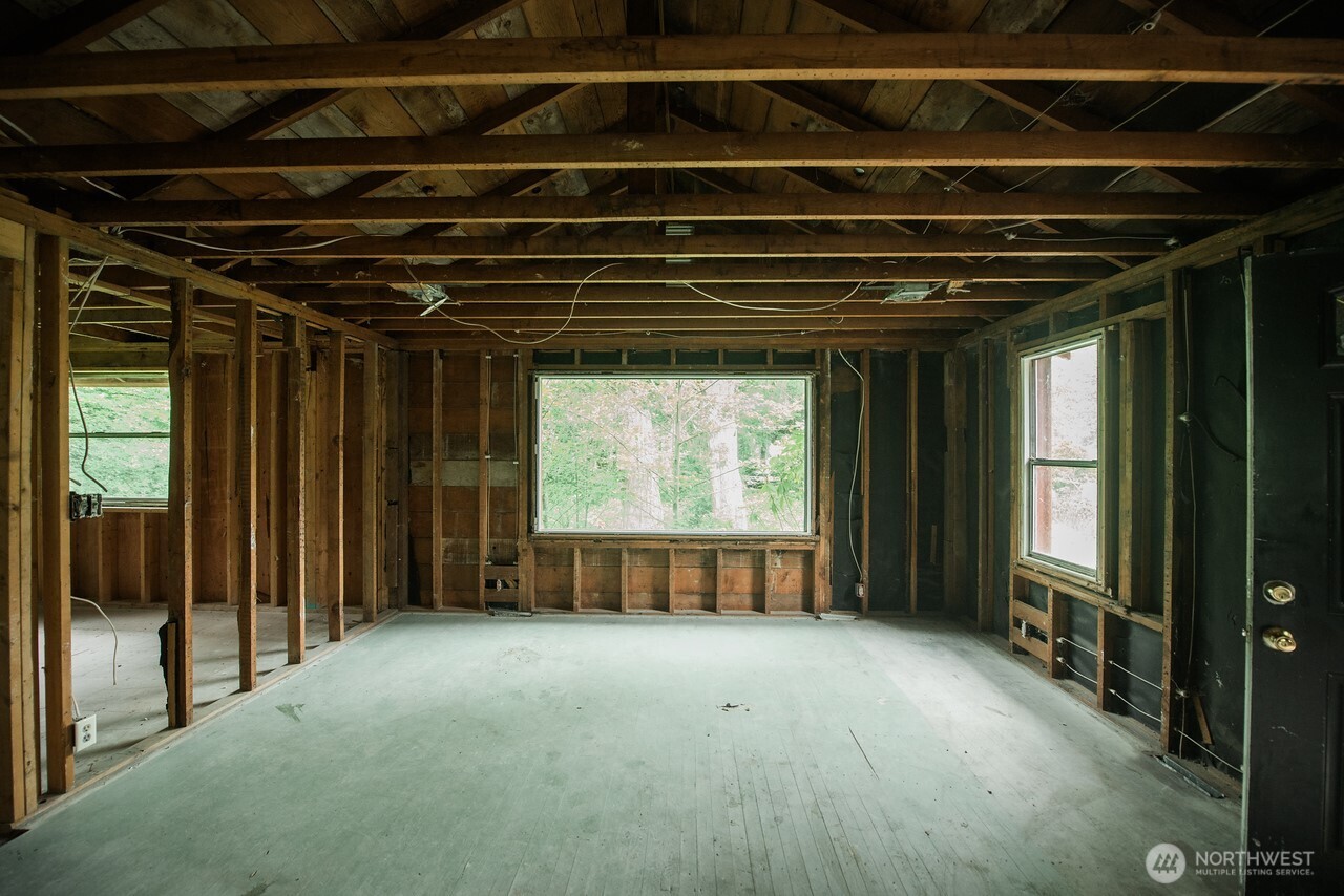 10379 Bethel Burley Road Southeast Port Orchard, WA 98367 - Photo 10 of 40 a view of an empty room with a window