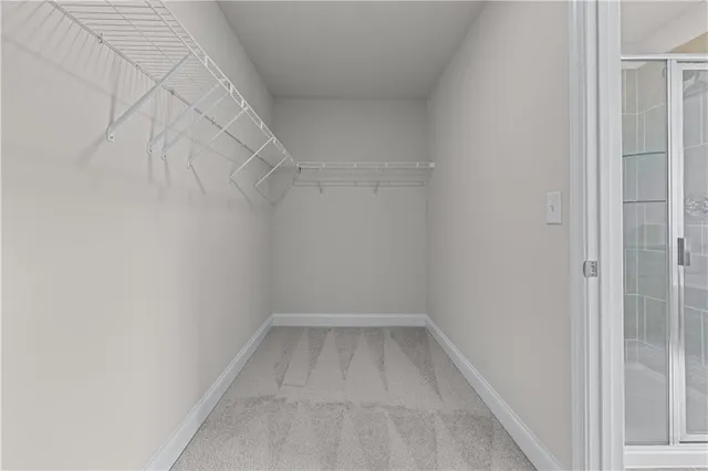 a view of a room with white walls