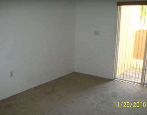 3345 Merrick Lane, Unit 1101 Margate, FL 33063 - Photo 6 of 9 an empty room with a window
