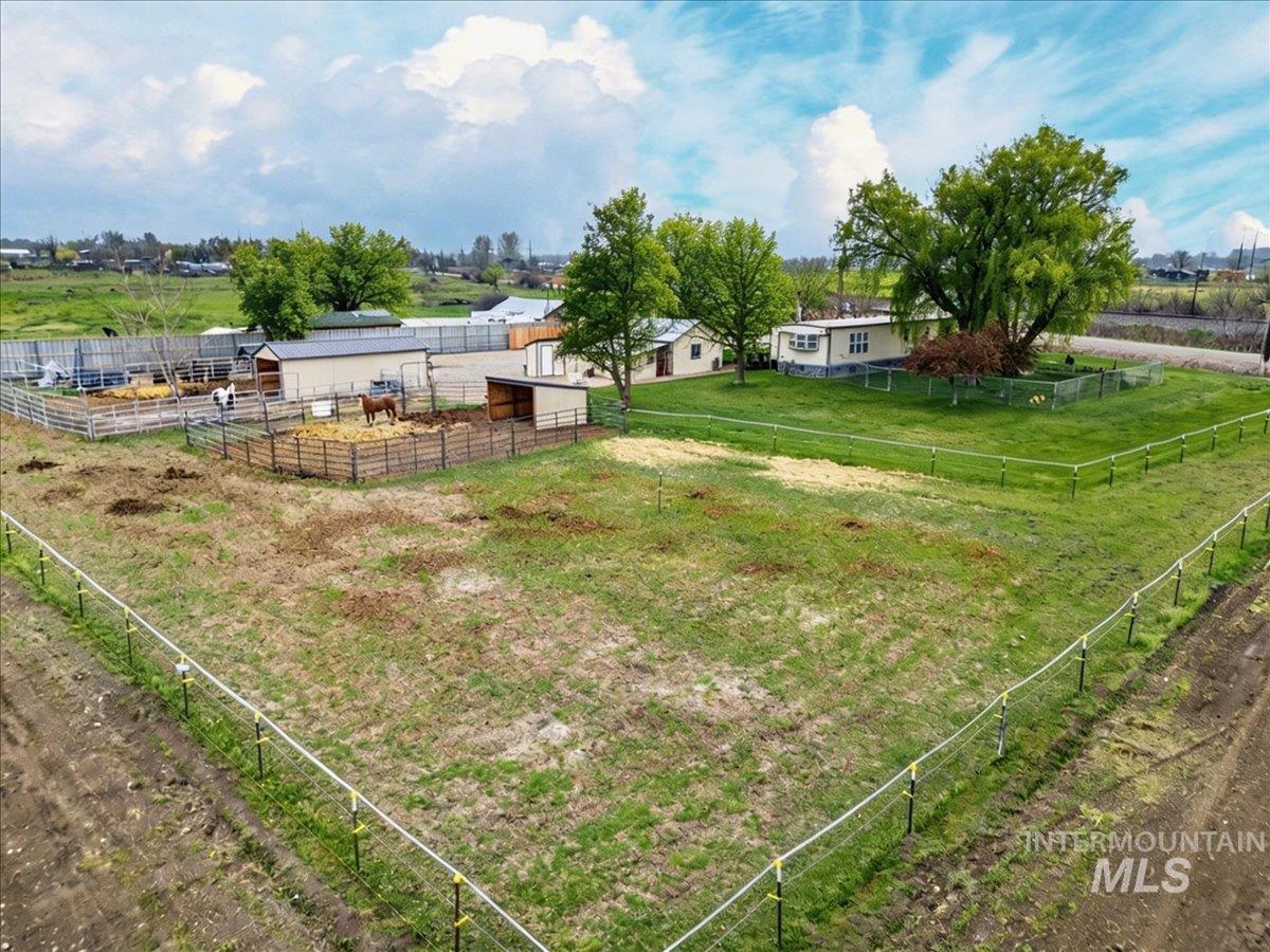 9228 Washoe Road Payette, ID 83661 - Photo 45 of 49 View of yard featuring an outdoor structure, a view of rural / pastoral area, and an exterior structure