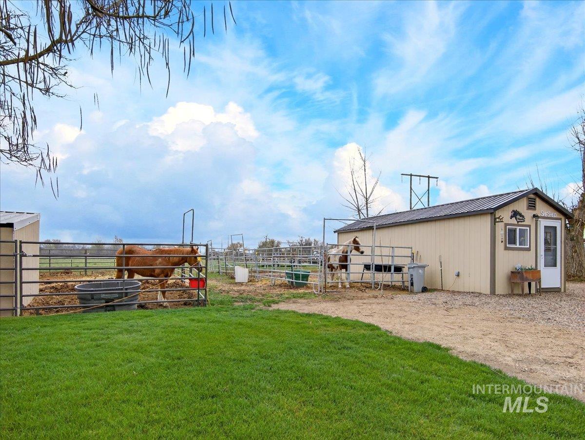 9228 Washoe Road Payette, ID 83661 - Photo 9 of 49 View of yard featuring an outbuilding and an exterior structure
