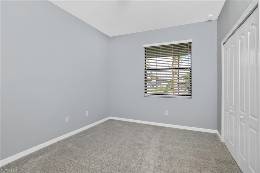 19952 Beverly Park Road Estero, FL 33928 - Photo 15 of 32 an empty room with windows