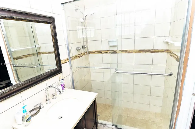 a bathroom with a sink and a bathtub