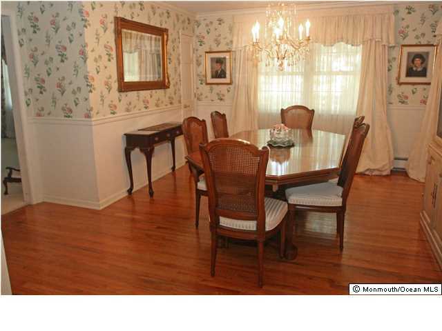 268 Pelican Road Middletown, NJ 07748 - Photo 8 of 21 a living room with furniture and wooden floor