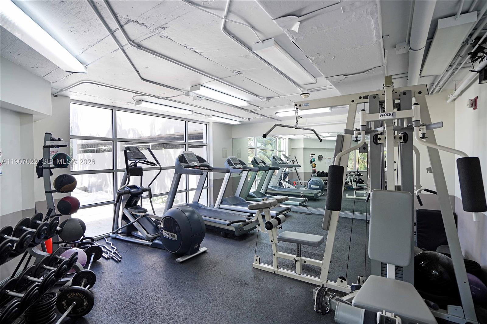 1621 Bay Road, Unit 604 Miami Beach, FL 33139 - Photo 17 of 30 a view of a room with gym equipment