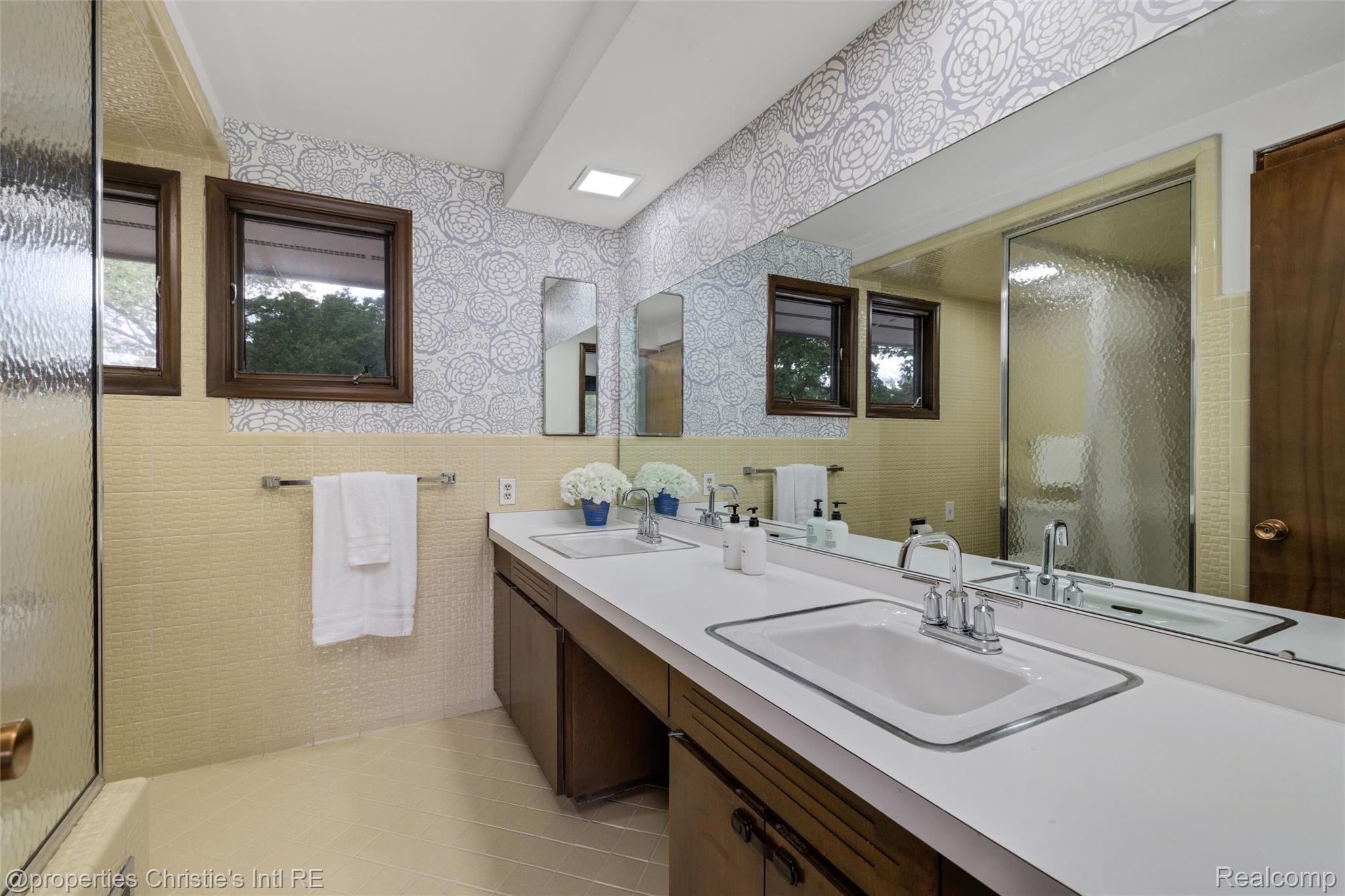 2771 West Seven Mile Road Detroit, MI 48221 - Photo 41 of 57 Dual vanity with integrated sinks and chrome fixtures
