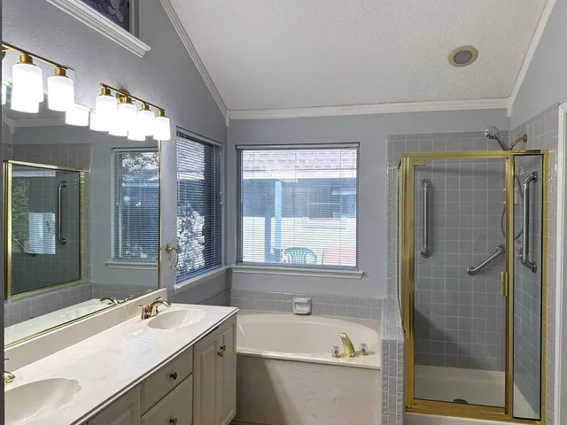 a bathroom with a toilet and shower