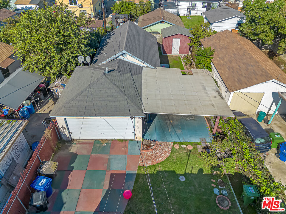 331 East 119th Street Los Angeles, CA 90061 - Photo 19 of 40 an aerial view of a house with yard